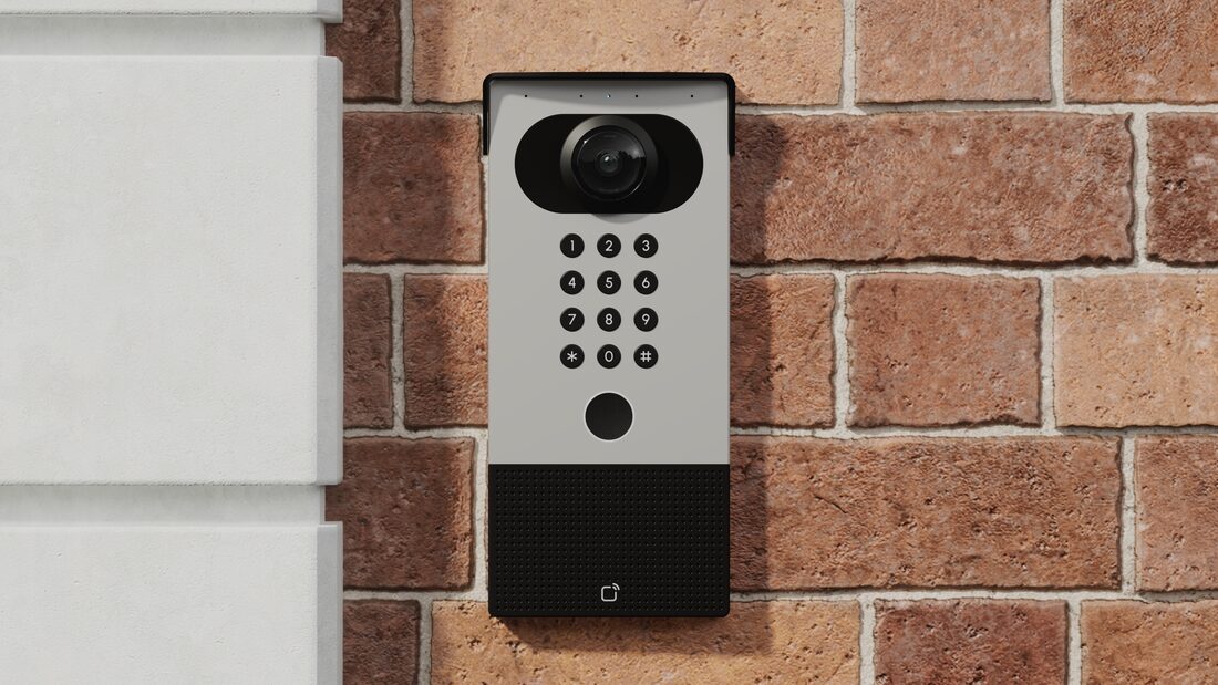 A video intercom on the brick wall of a public building