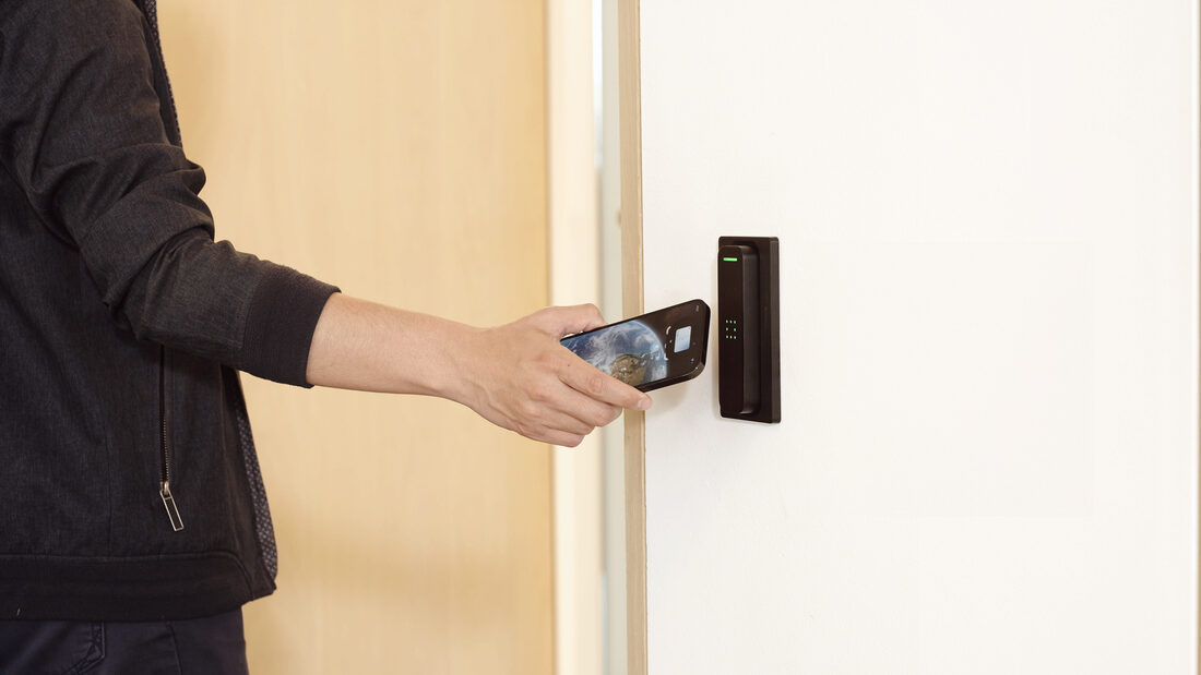 Entry by phone at a door reader