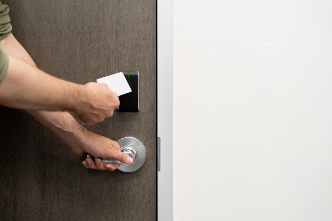 A Verkada door reader installed beside a glazed entrance door